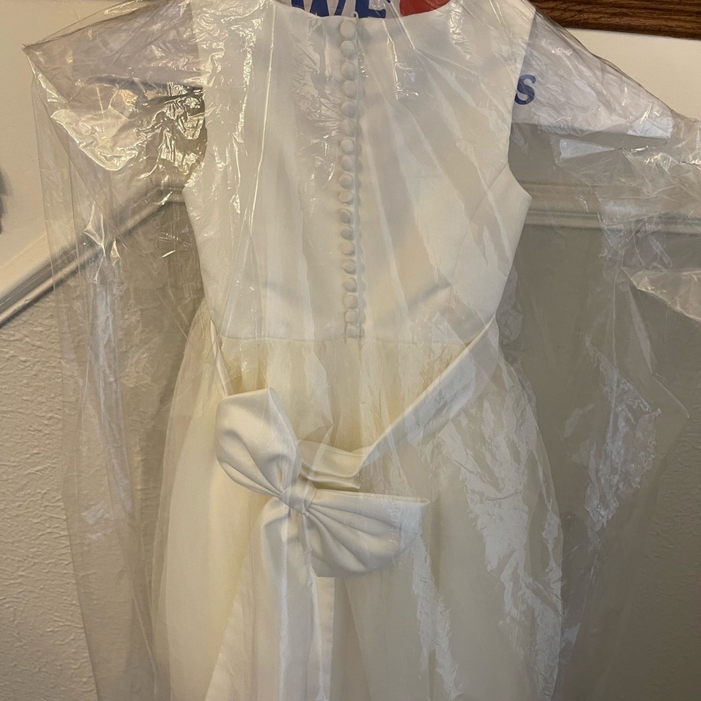 White flower girl dress from David’s Bridal